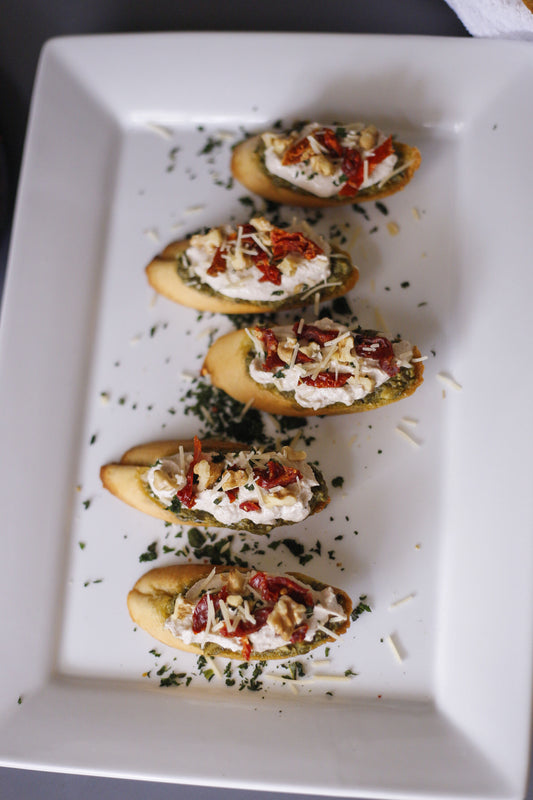 Pesto Sundried Tomato and Walnut Crostini's